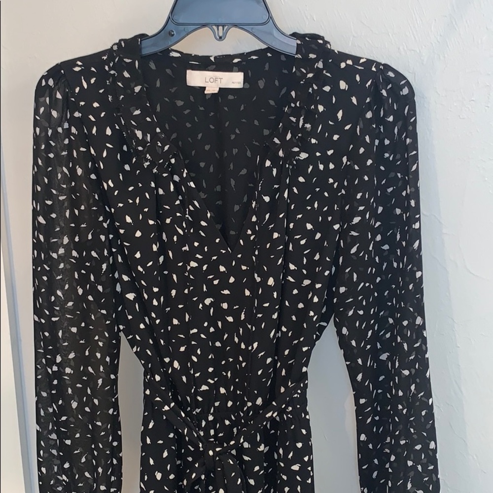Woman’s Black Dress